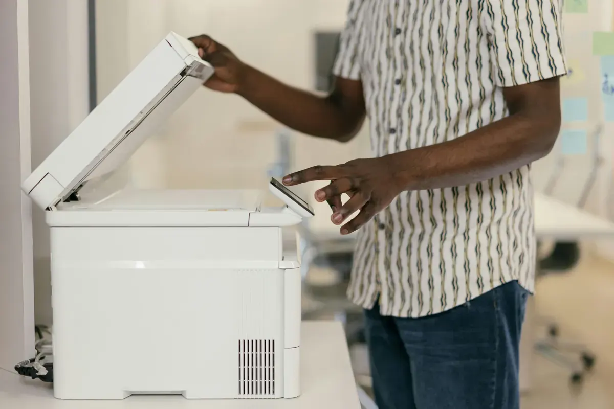 Office worker using a photocopier for the Canon back-office workflow case study